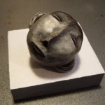 . 2005, polymer clay and acrylic paint on a painted wood base