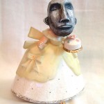 . papier-mâché, acrylic paint and found ceramic figurine