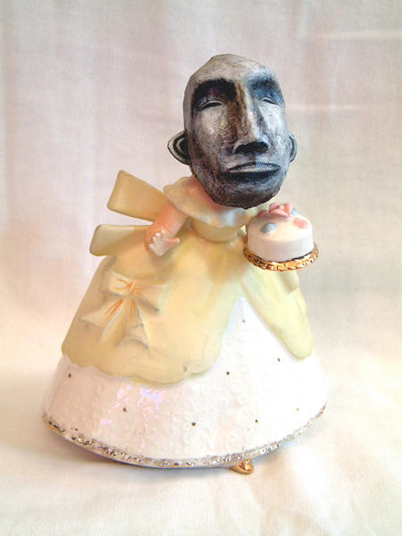 . papier-mâché, acrylic paint and found ceramic figurine